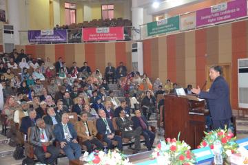 03- Sectery HED Syed Zafar Ali talking to Conferece while  VC KMU, Member Ops & Planing Dr Ghulam Raza Bhatti setting on stage during first International conference on qulaity assurance (Custom)1513657699.JPG